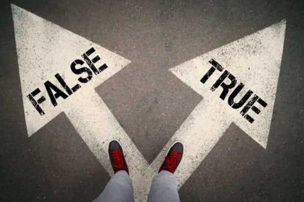 Image of person standing on arrows that read false and true