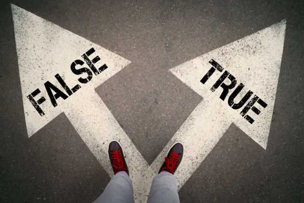 Image of person standing on arrows that read false and true
